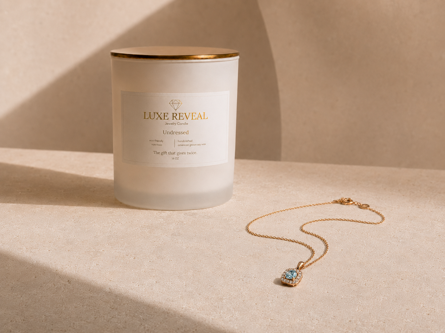 Undressed Luxe Reveal candle with delicate jewelry necklace